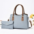 Striped light blue PU leather tote bag set with brown handles and a matching wallet - Blue