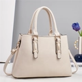 Elegant beige lychee grain faux leather handbag with dual handles and gold hardware - Off White