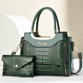 Detail of dark green crocodile pattern patent leather handbag set with gold handles - Green