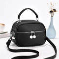 Three-layer black lychee texture leather crossbody bag with silver hardware on white background - L22 W11 H16 / Black