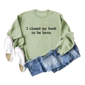 Sage green long sleeve sweatshirt with 'I closed my book to be here' slogan text - S / Olive Green (Black Font)