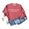 Flat lay of a red sweatshirt with 'I closed my book to be here' text and casual jeans - S / Red (White Font)