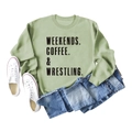 Close-up of light green sweatshirt with WEEKENDS COFFEE WRESTLING print and soft cotton texture - Olive Green (Black Letter)