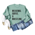 Flat lay of mint green crewneck sweatshirt with black text print and styling props - Light Teal (Black Letter)