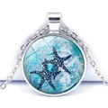 Detailed view of ocean-themed necklace with starfish glass pendant and silver O-chain - Starfish Pattern (XSWX3529-4) / Silver