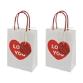 Two white kraft paper gift bags with red hearts and LO YOU text for Valentine's Day - White