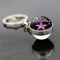 Macro view of double-sided glass pendant keychain with I Love Gymnastics silhouette - Black Background Pink Silhouette Style (JY006263-8)