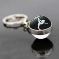 Macro view of crystal glass keychain featuring a gradient rhythmic gymnastics silhouette - Gradient Color Sports Silhouette (JY006263-7)