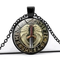 Macro shot of Viking pendant with winged sword and Nordic runes under time gem glass - Winged Sword Rune (JY006280-5)