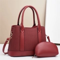 Detail view of burgundy wine textured PU leather tote and matching small coin purse set - One Size / Red