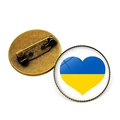 Detailed front and back view of a vintage heart-shaped Ukrainian flag evil eye brooch - Bronze-Blue Yellow Heart (JY006303 Bronze-13)