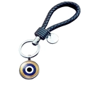 Macro detail of hand-woven black leather cord and silver metal evil eye keychain ring - Blue Gold Mandala Eye (JY006342-3)