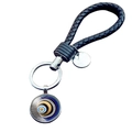 Dettaglio portachiavi malocchio blu con cinturino in pelle nera e anello in metallo argento - Motivo Radiale a Spirale Blu Oro (JY006342-11)