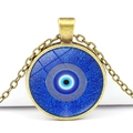 Detailed close-up of a blue evil eye glass pendant on a bronze alloy necklace chain - Mandala Style Eyeball Style (JY006321-4)