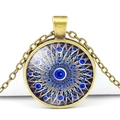Detailed close-up of a bronze Turkish evil eye pendant with blue mandala crystal pattern - Blue Geometric Mandala Style (JY006321-7)