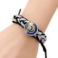 Macro shot of handmade braided cord bracelet with central blue evil eye charm detail - Vortex Blue Eye Woven Style (JY006349-11)