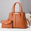 Close-up of brown faux leather tote with woven texture and gold metal detail - Tote Bag And Envelope Clutch (707-2) / Earthy Yellow