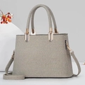 Elegant woven multi-layer tote bag in beige and grey with gold hardware and shoulder strap - Khaki