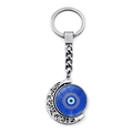 Macro-opname van de roterende maan hanger met blauw boze oog voor aan een sleutelhanger - Vintage Opengewerkt Patroon Stijl (JY006337-4)