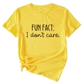 Detail of yellow cotton T-shirt featuring FUN FACT: I don't care slogan and knot hem detail - S / Yellow