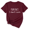 Detail of dark red cotton T-shirt featuring 'FUN FACT: I don't care.' text with a front knot - S / Burgundy