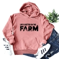 Rosafarbener Kapuzenpullover 'Life is better on the farm' mit Traktor-Grafik - S / Roségold