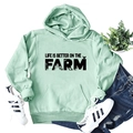 Light green hoodie with Life Is Better On The Farm text and farm graphics print - S / Light Green