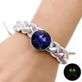 Luminous braided zodiac bracelet with Gemini charm showing normal and glow-in-the-dark effects - 3-Gemini