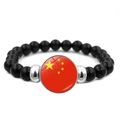 Beaded bracelet with black polished beads and China five-star red flag glass pendant - China