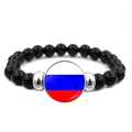Detail of beaded bracelet with black onyx beads and Russian flag glass dome charm - Russia