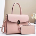 Pink faux leather handbag set with tote bag and matching zipper pouch in 45-degree view - Pink