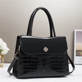 Black crocodile embossed leather handbag with gold clover buckle and top handle - Large / Black