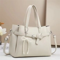 Chic cream patchwork leather handbag with pearl bow pendant and detachable shoulder strap - L29 W13 H22cm / Off White