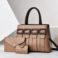 Detailed view of the three-piece handbag set featuring a tote and matching wallets - Khaki