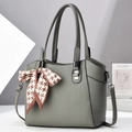 Grey textured leather tote bag with houndstooth ribbon bow and adjustable shoulder strap - Gray