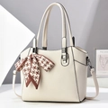 Chic beige lychee leather tote bag with houndstooth scarf and silver hardware detail - White