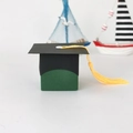 Miniature graduation cap gift box in green and black with a yellow silk tassel - Green