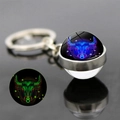 Luminous Taurus zodiac crystal ball keychain with glow-in-the-dark constellation pattern - Taurus