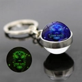 Luminous Leo zodiac sign keychain with glowing glass ball and silver metal ring - Leo