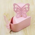 Pink pearl paper candy boxes with 3D butterfly cutouts on a light wooden background - Small / Pink