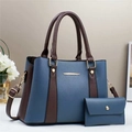 Borsa a mano bicolore blu e marrone con bustina coordinata e dettagli dorati chic - Blu