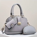 Three-piece grey-purple pebble leather tote bag set with gold hardware on marble base - Gray