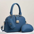 Detailed view of navy blue lychee grain leather tote set with gold metal hardware details - Blue