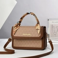 Detail of vintage brown quilted bag with fashion logo and silk scarf on the handle - 21.5x14x8cm / Khaki