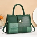 Detail of dark green tote bag showing textured faux crocodile skin and metal lock - Green / 30x10x21cm