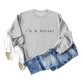 Flat-lay detail of light grey I'M A DELIGHT sweatshirt with denim shorts and sneakers - Grey (Black Font)