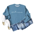 Flat lay of teal goat mama sweatshirt with denim shorts and white canvas sneakers - Blue (White Font)