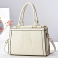 Dettaglio della borsa tote bianco crema con trama litchi e strisce verticali - Bianco Sporco