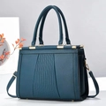 Elegante borsa a mano verde acqua in finta pelle con dettagli dorati e tracolla - Blu