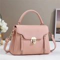 Pink lychee texture leather crossbody bag with gold hardware and top handle design - Pink